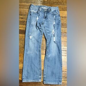 Woman’s Blue Distressed Jeans